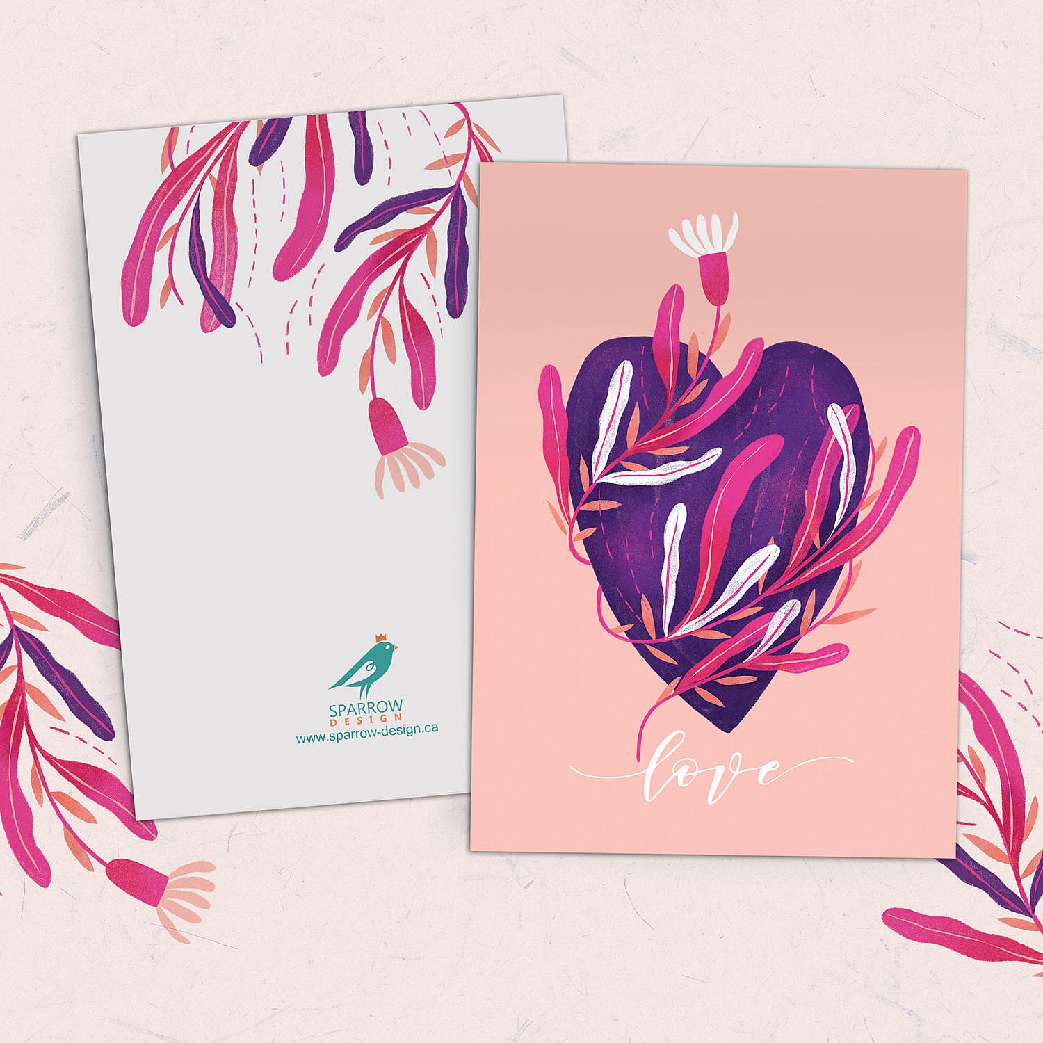 Valentine's card showing a pink heart with light pink and white flowers around it